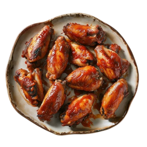 Alitas de pollo crujientes con salsa barbacoa en Kokcha Barcelona