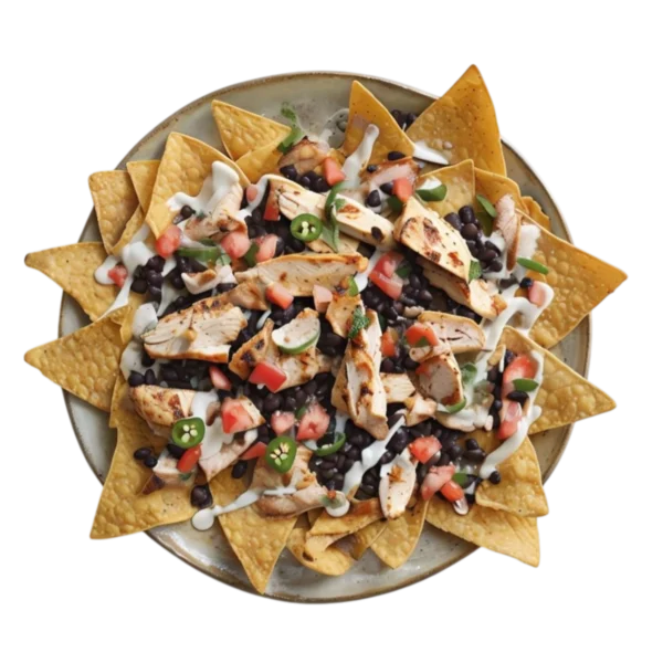 Nachos con pollo, queso fundido, frijoles y jalapeños en Kokcha Barcelona