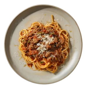 Espaguetis boloñesa con carne de ternera y queso rallado en Kokcha Barcelona
