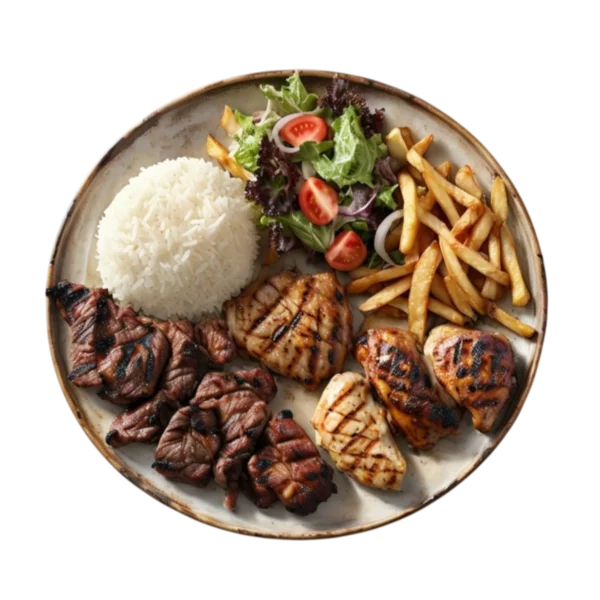 Plato combinado de ternera y pollo con ensalada en Kokcha Barcelona