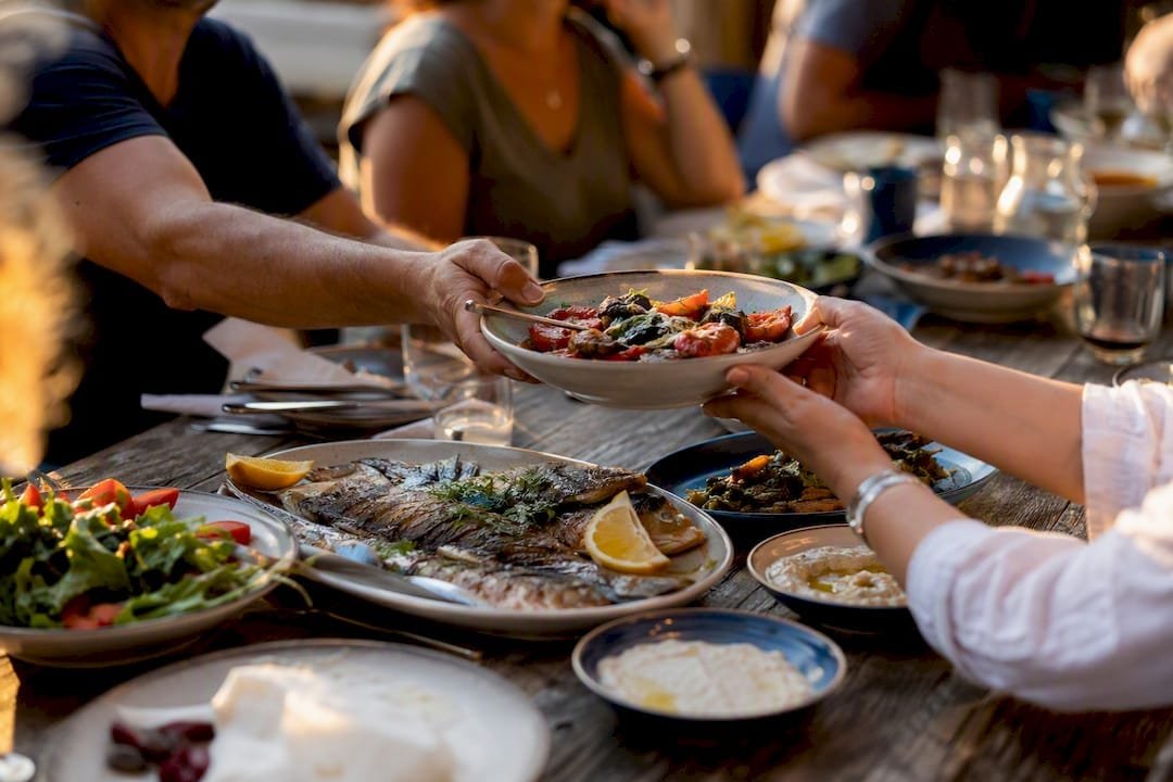 Seafood dishes shared Mediterranean table